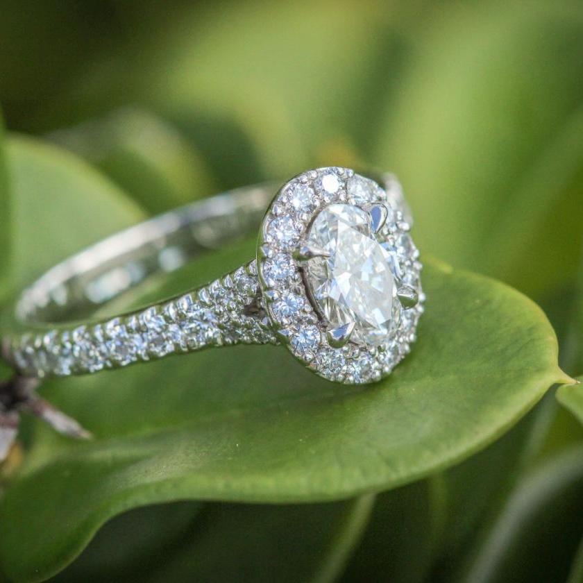 PLATINUM & OVAL DIAMOND HALO RING