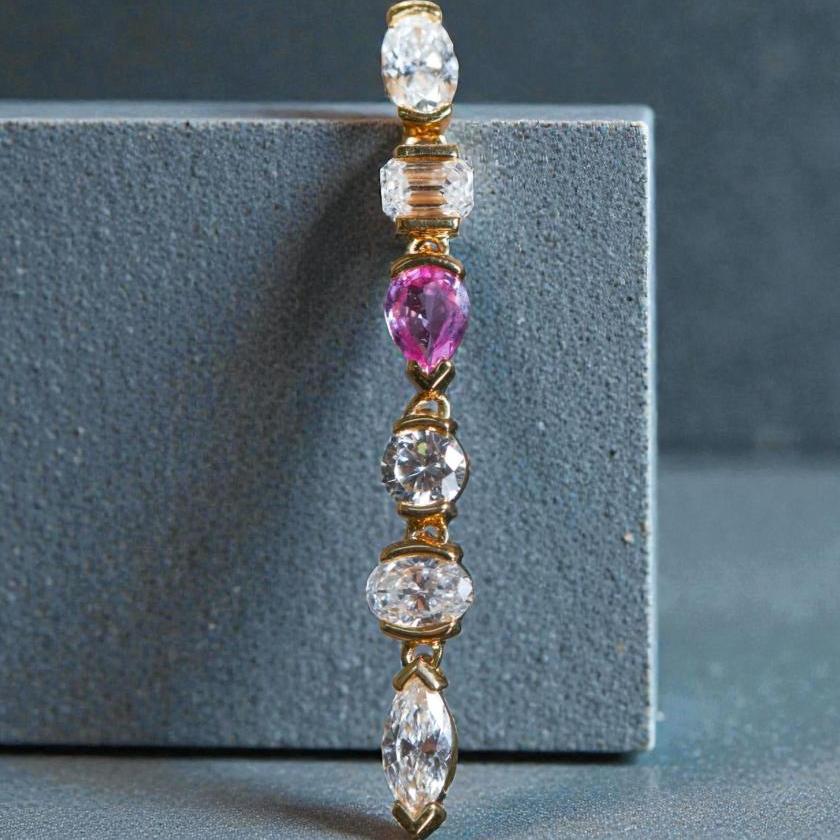 18CT YELLOW GOLD DIAMOND AND PICK SAPPHIRE POPS