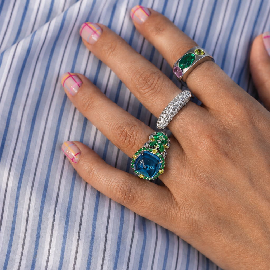 TOPAZ, EMERALD AND SAPPHIRE RING