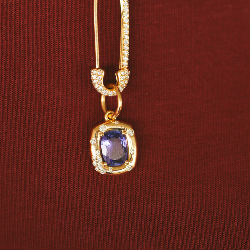 18CT YELLOW GOLD TANZANITE AND DIAMOND PENDANT