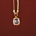 18CT YELLOW GOLD TANZANITE AND DIAMOND PENDANT