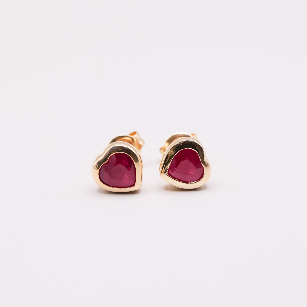 RUBY HEART STUDS