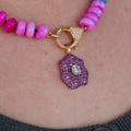 18CT ROSE GOLD WITH PINK SAPPHIRES AND DIAMOND PENDANT