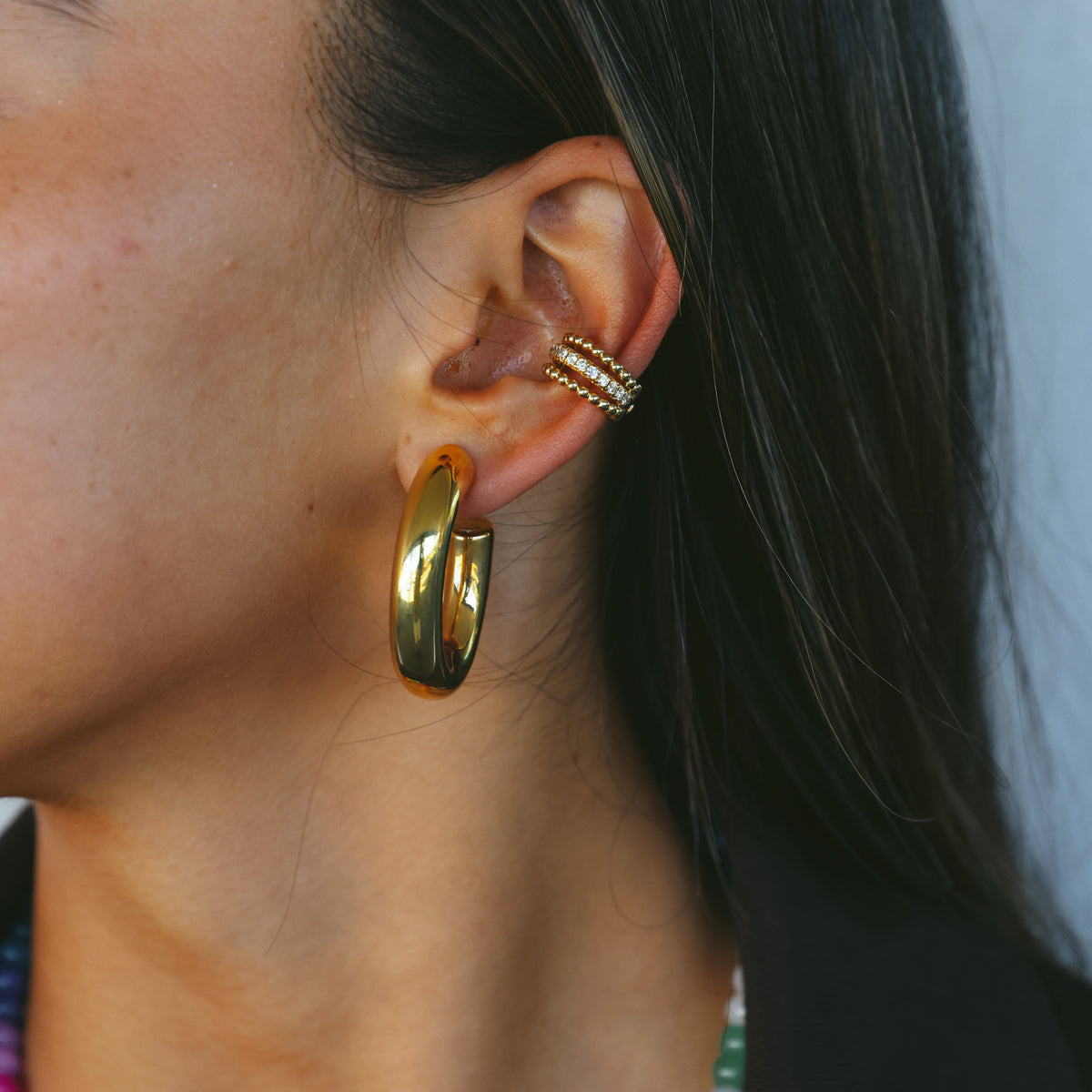 18CT YELLOW GOLD AND DIAMOND EAR CUFF