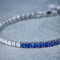 18CT WHITE GOLD CEYLON SAPPHIRE & DIAMOND TENNIS BRACELET