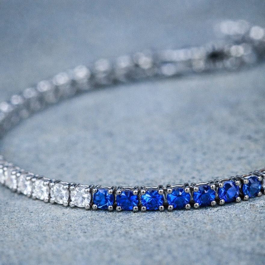 18CT WHITE GOLD CEYLON SAPPHIRE & DIAMOND TENNIS BRACELET