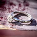 PLATINUM & ROUND BRILLIANT CUT KNIFE EDGE SOLITAIRE