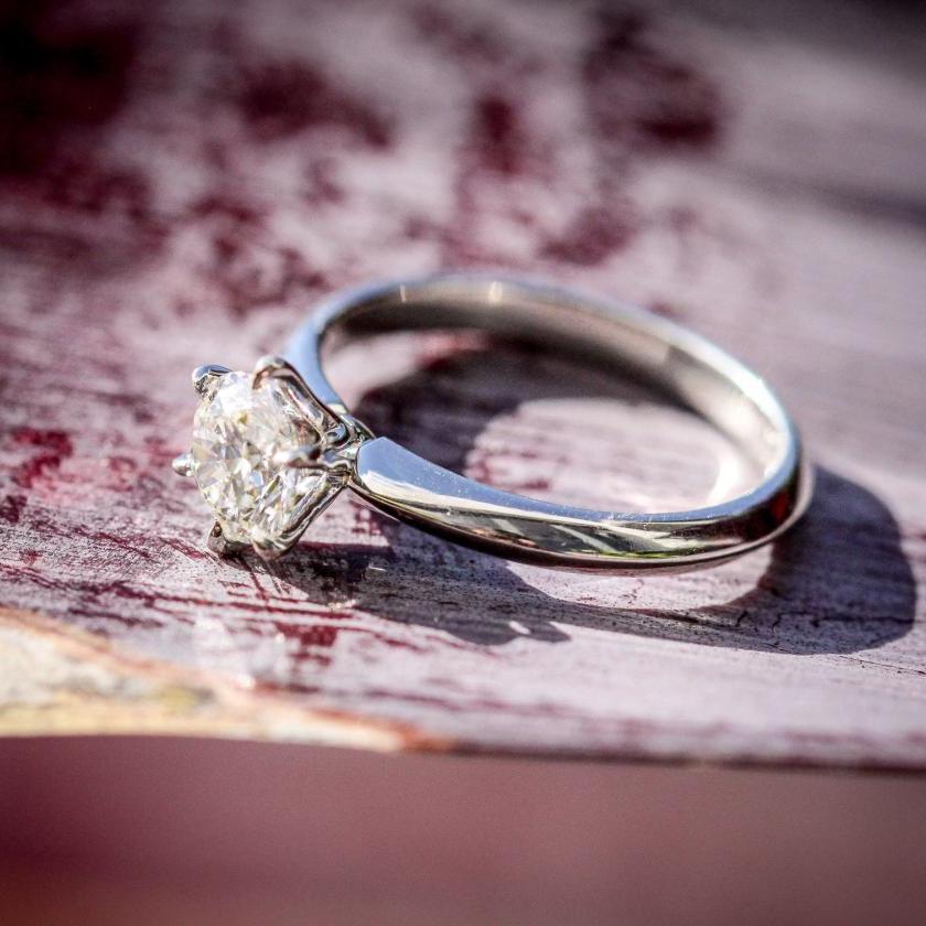 PLATINUM & ROUND BRILLIANT CUT KNIFE EDGE SOLITAIRE