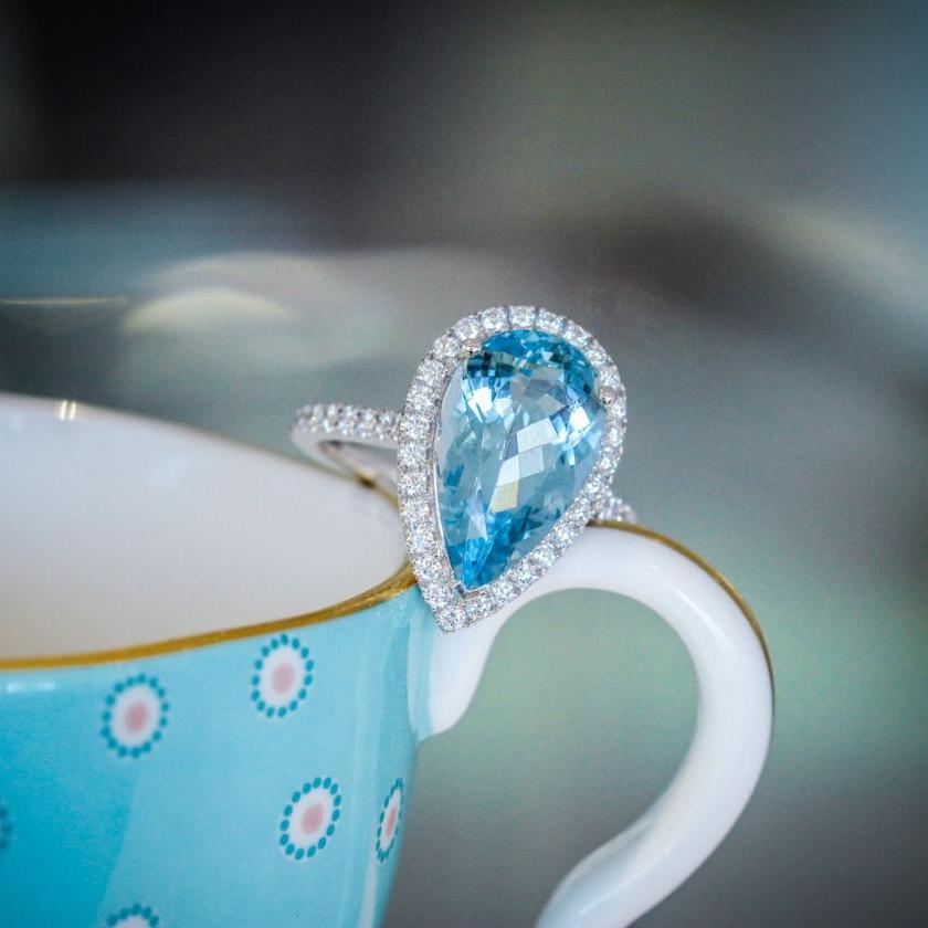 PLATINUM 4.67CT AQUAMARINE & DIAMOND HALO RING