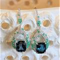 TOPAZ, EMERALD & DIAMOND DROP EARRINGS