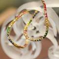 Radiant Rainbow Twist Hoops