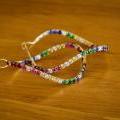 Radiant Rainbow Twist Hoops